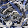 Tangled textile strips ready for recycling.